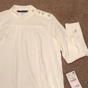 White pearl blouse